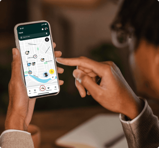 Group of people in a circle looking down