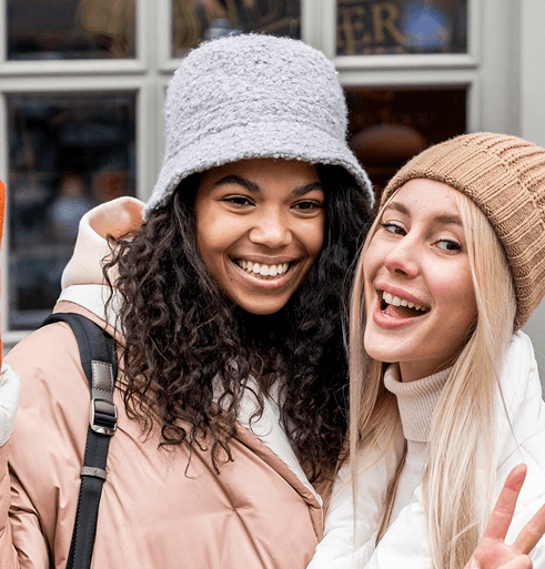 Two women smiling together