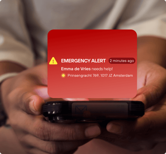 Group of people in a circle looking down